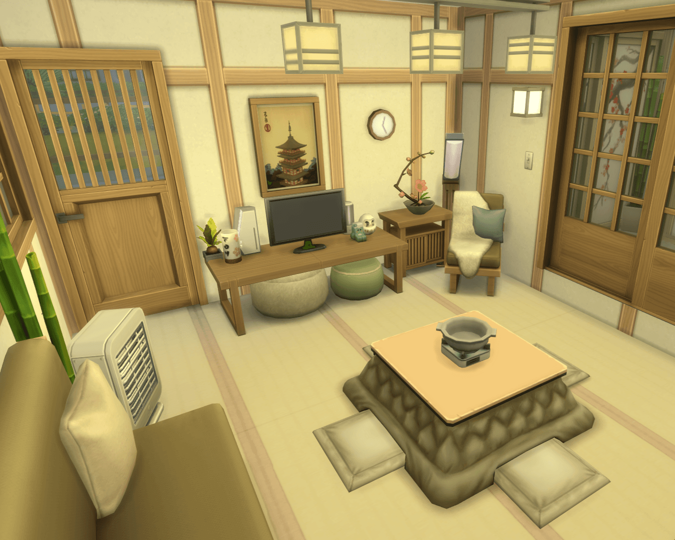 Thumbnail View of the other side of the room, with a tv, gaming console, comfy reading corner armchair, clock and poufs for extra seating or leg resting! door leads out to a side porch with plants and a chess table!