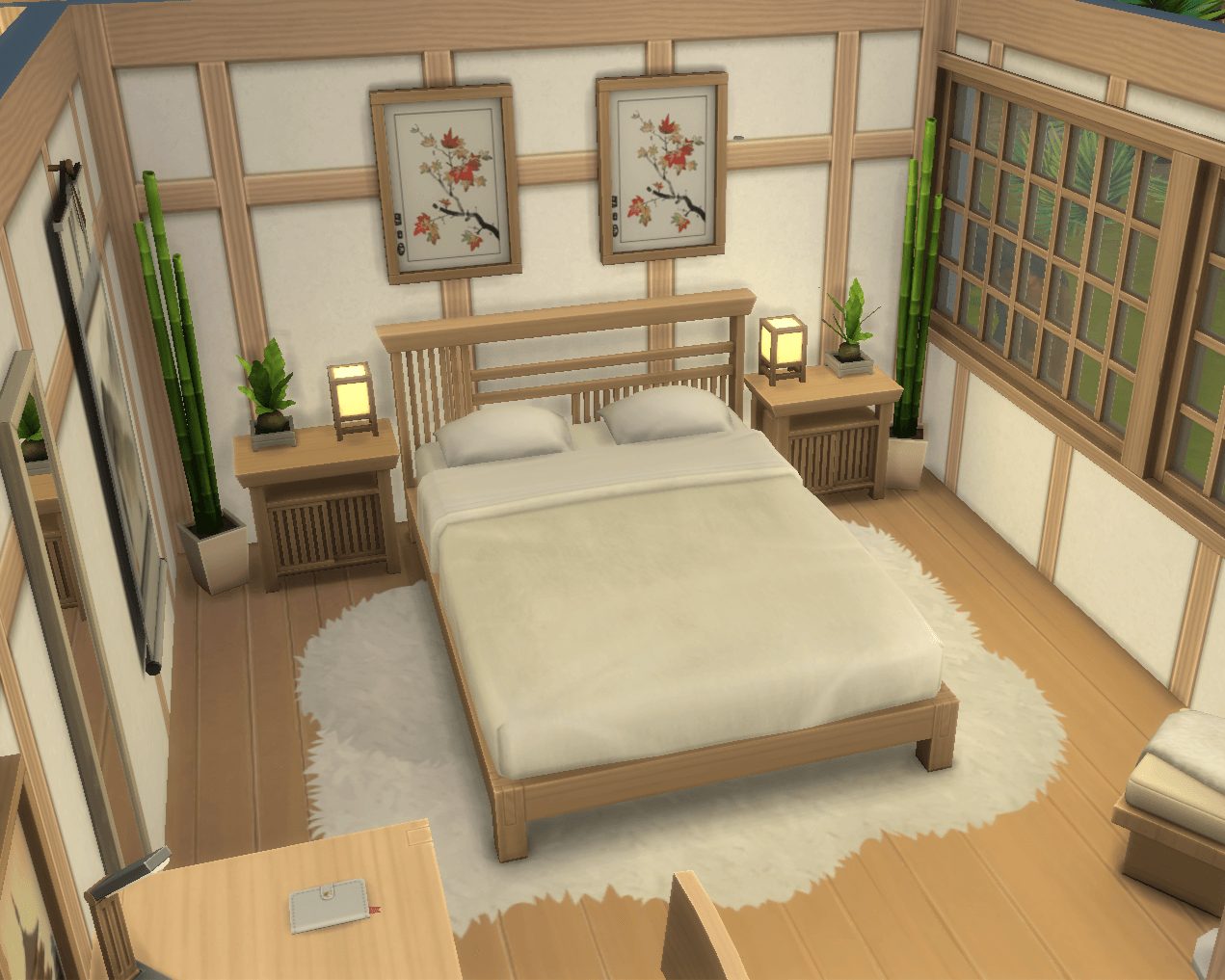 Thumbnail view of the neutral colour palette bedroom, with matching wood tones, minimalist decor, plants and a cosy vibe. A desk, wardrobe, mirror and armchair is also on the other side of this room!