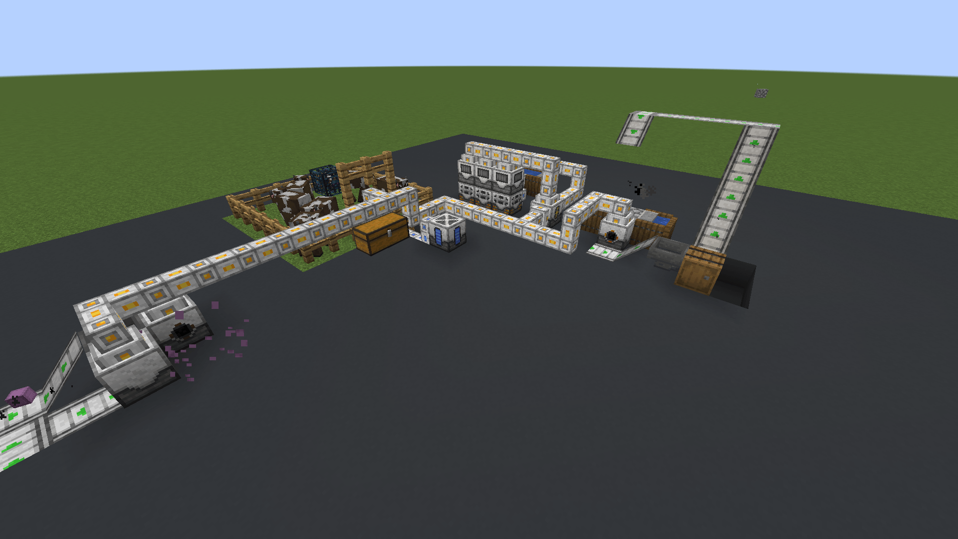 A small factory with a Breaker/Placer loop, Mob Grinder, Steam Generator setup, and a cobblestone generator.