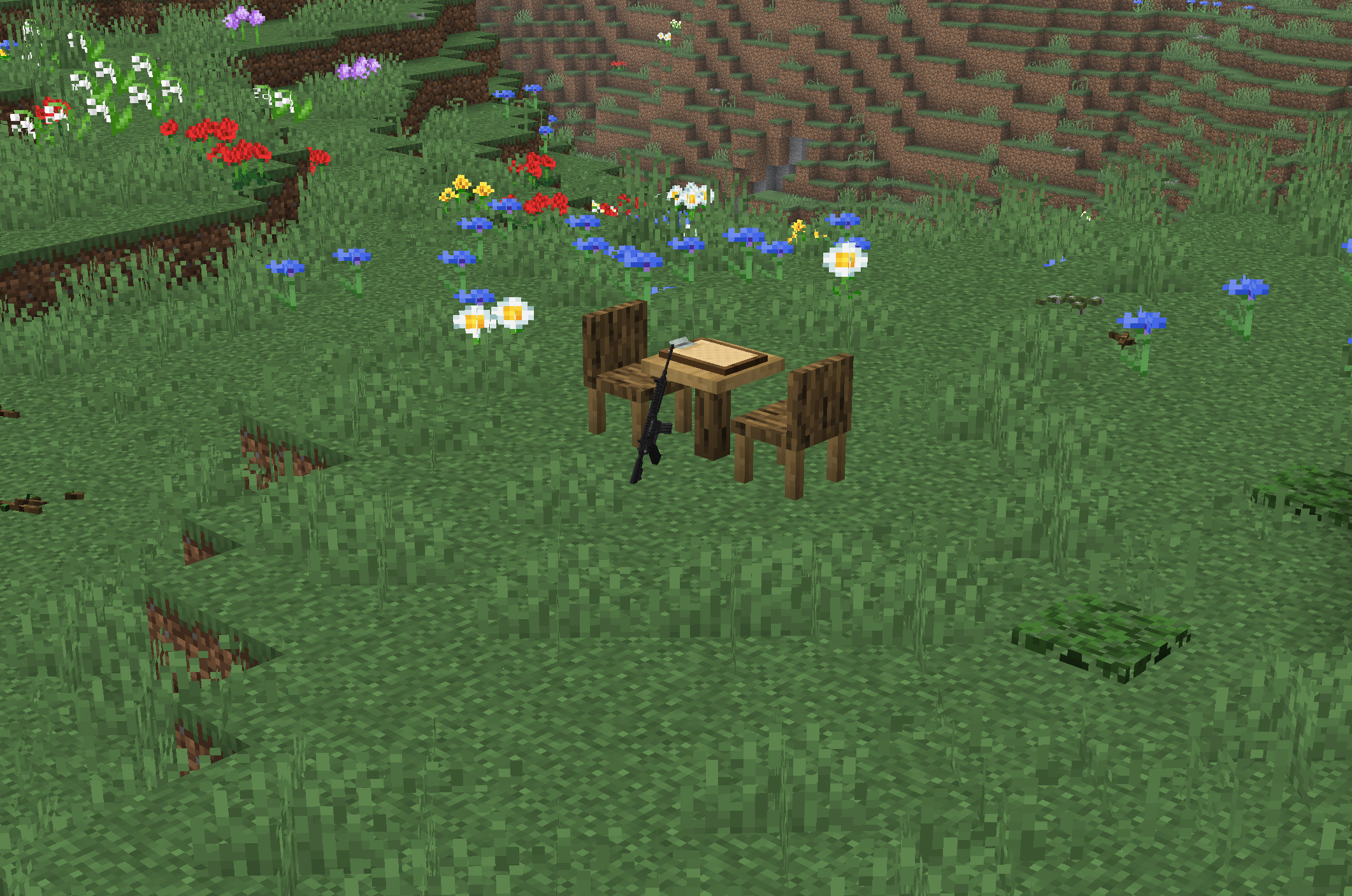 A scenic screenshot showing some of the mods in the modpack mixed with terrain