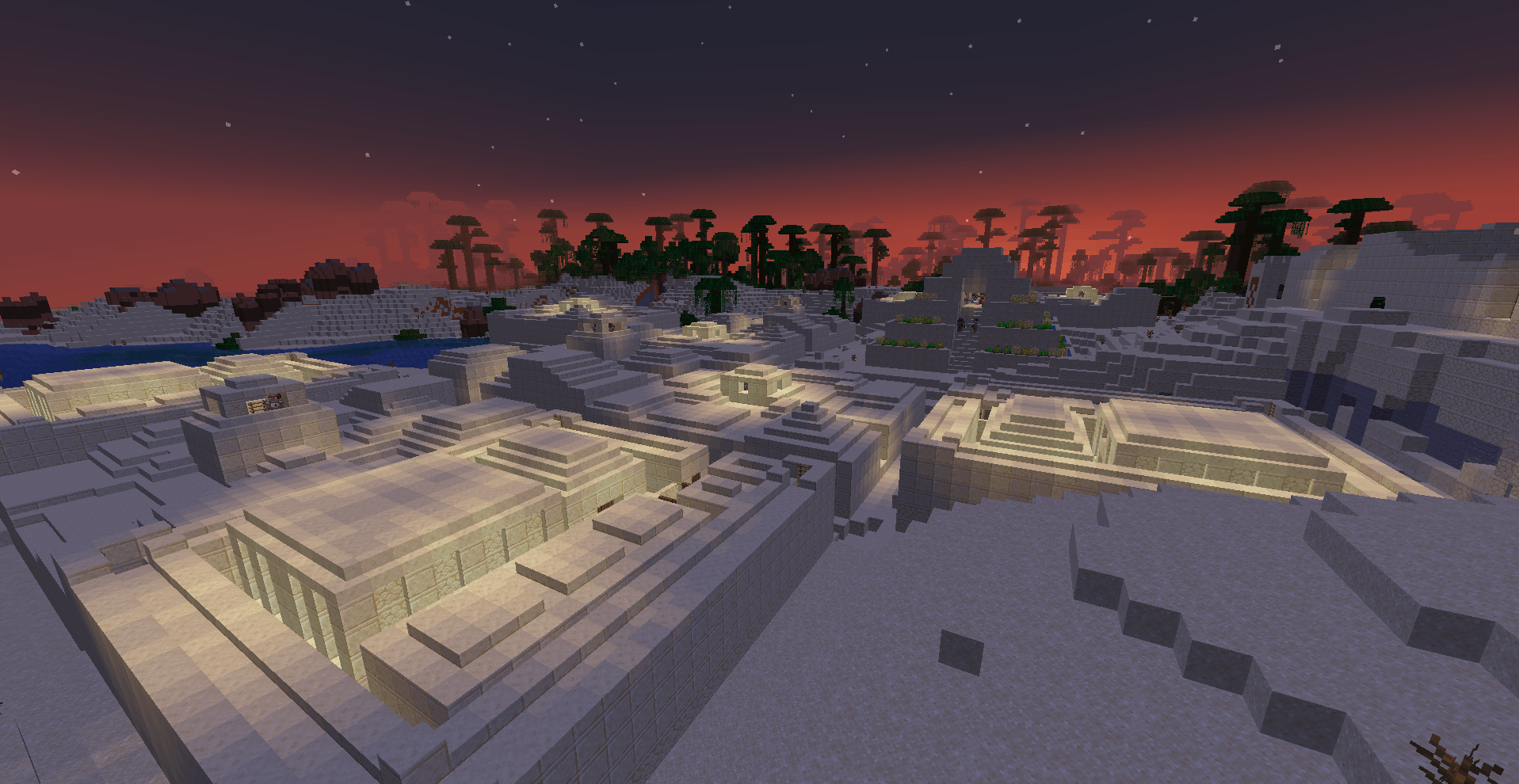 Thumbnail A desert city against the backdrop of a jungle and a beautiful sunset.