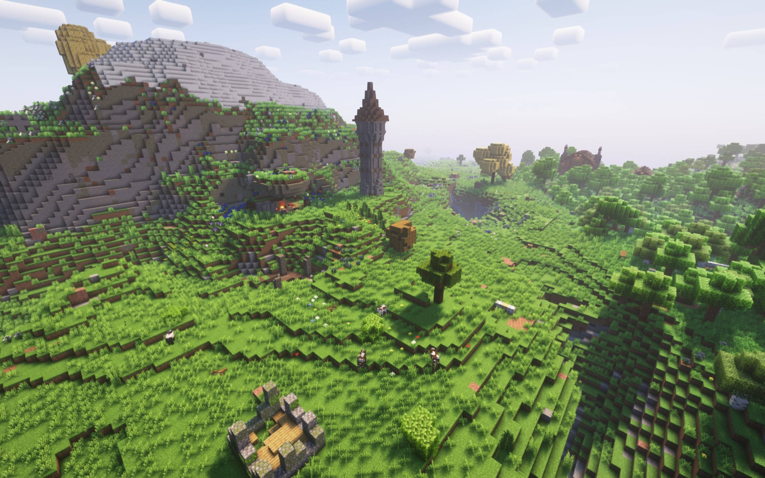 Thumbnail A plains biome teeming with activity nestled between a Mountain and a forest.