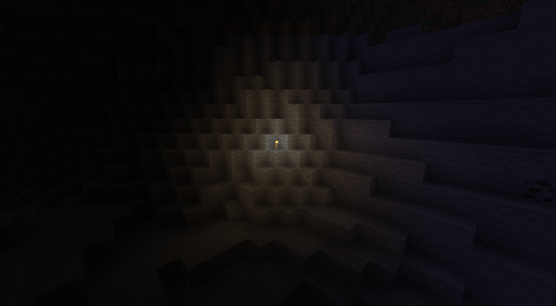 An isometric view of a cave lit by a torch with Shine on.