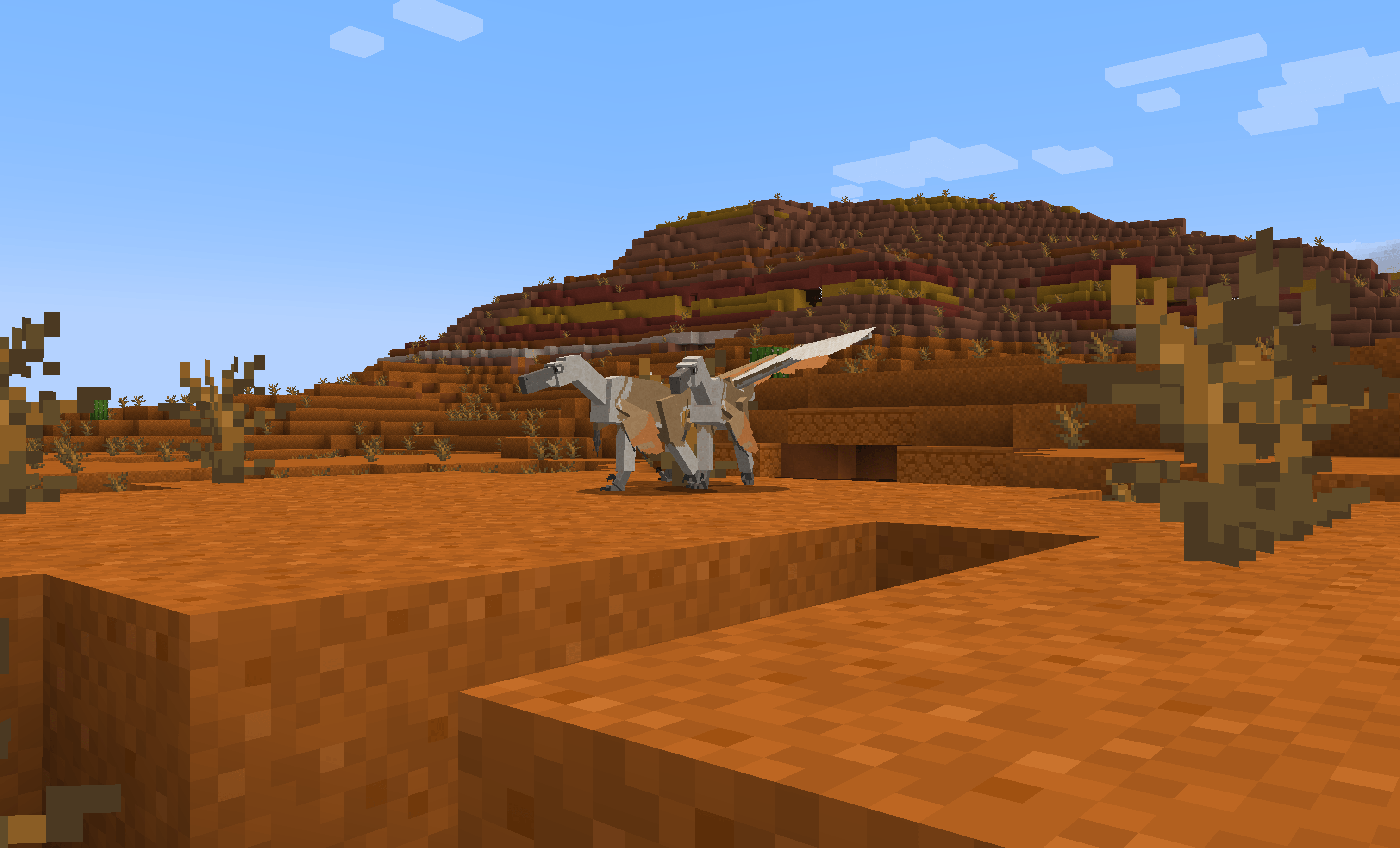 Two velociraptors hanging out in the badlands