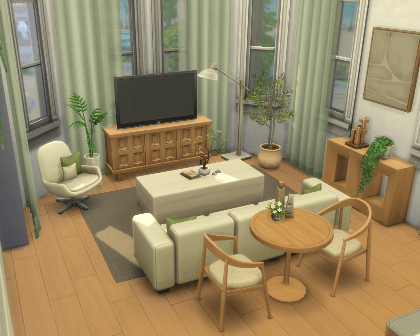 Thumbnail A warm and comfy living room with soft materials, woods, sheer green curtains, plants and big bookcases on the left!