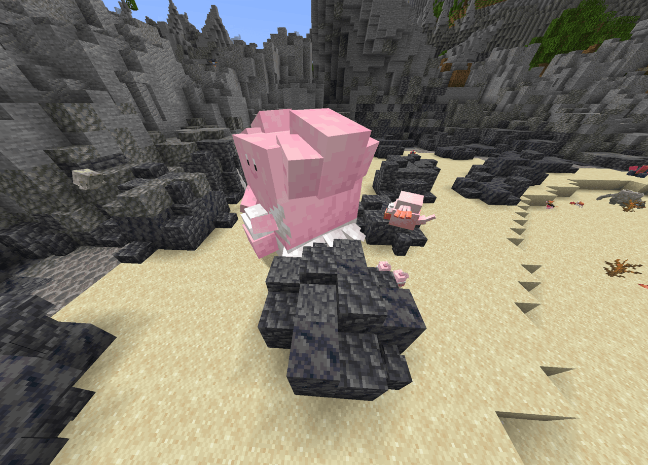 Thumbnail A giant Alpha Blissey stands out on a rocky Minecraft beach, towering over its surroundings in the Cobblemon modpack.
