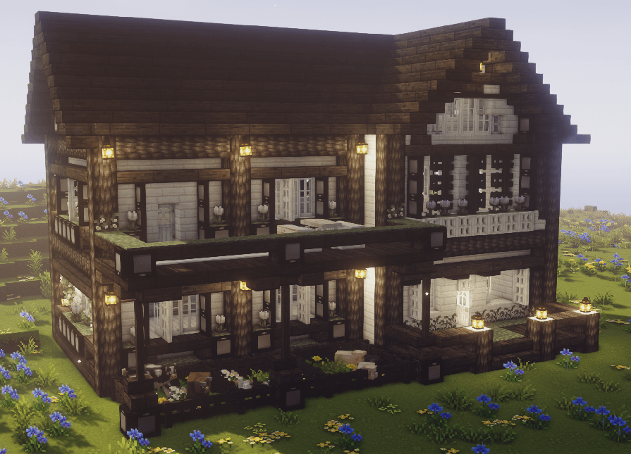 Thumbnail A Minecraft house made of pale oak and dark oak in a meadow. Animals are corralled in pens attached to the house.