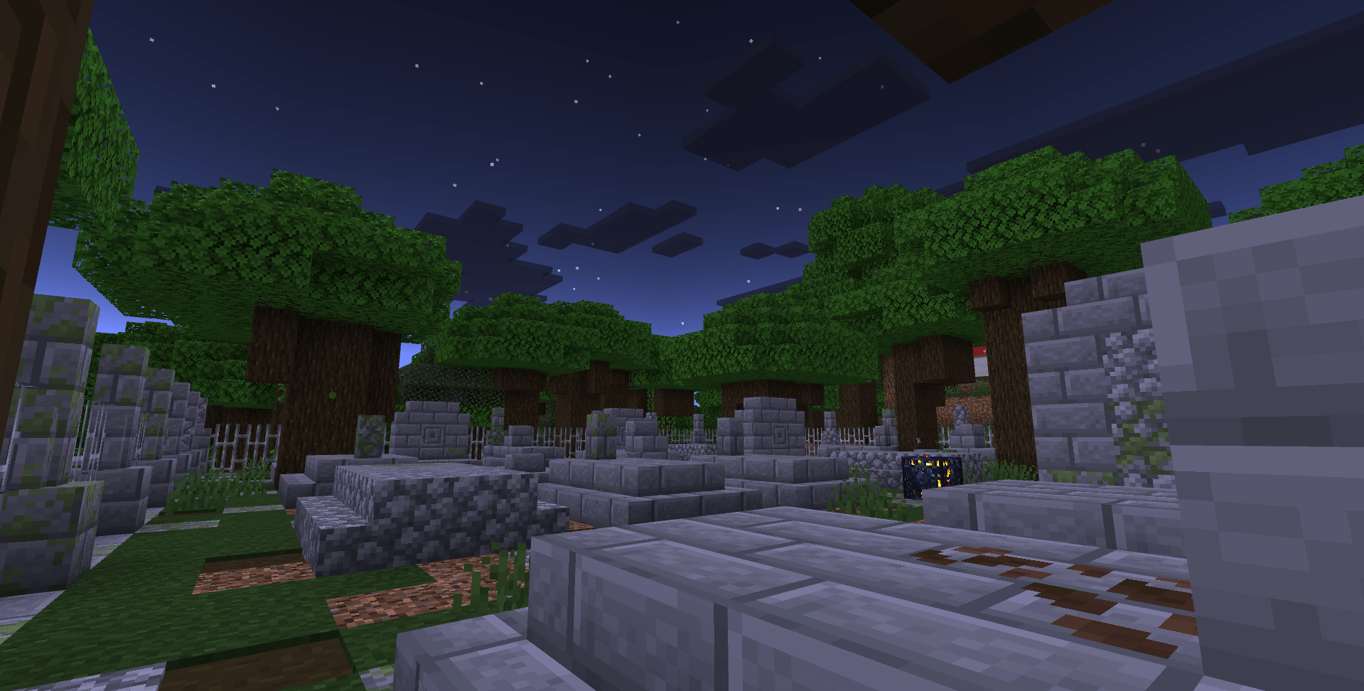 A graveyard in a dark oak forest