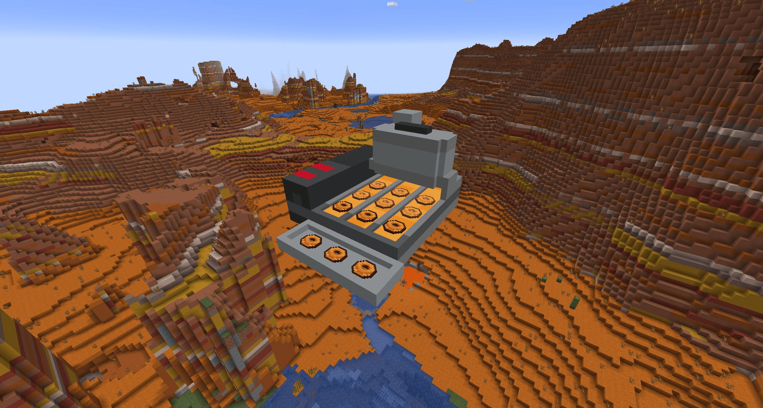 A picture of a Mini Donut Machine showing how it renders tje Donuts