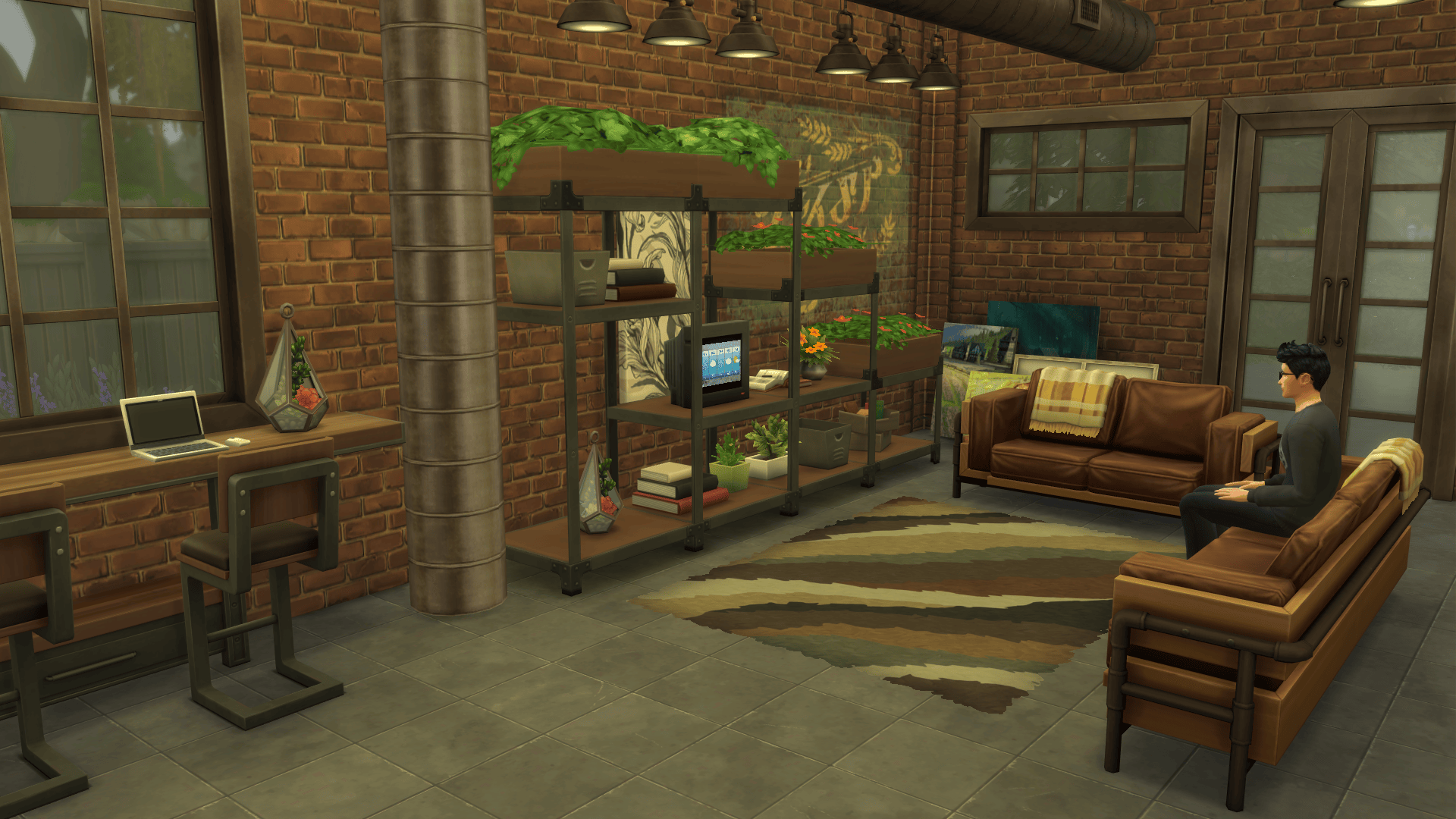 A living area making use of the modular shelving unit, sofa and new wall-mounted bar table. It also features a new ventilation duct piece