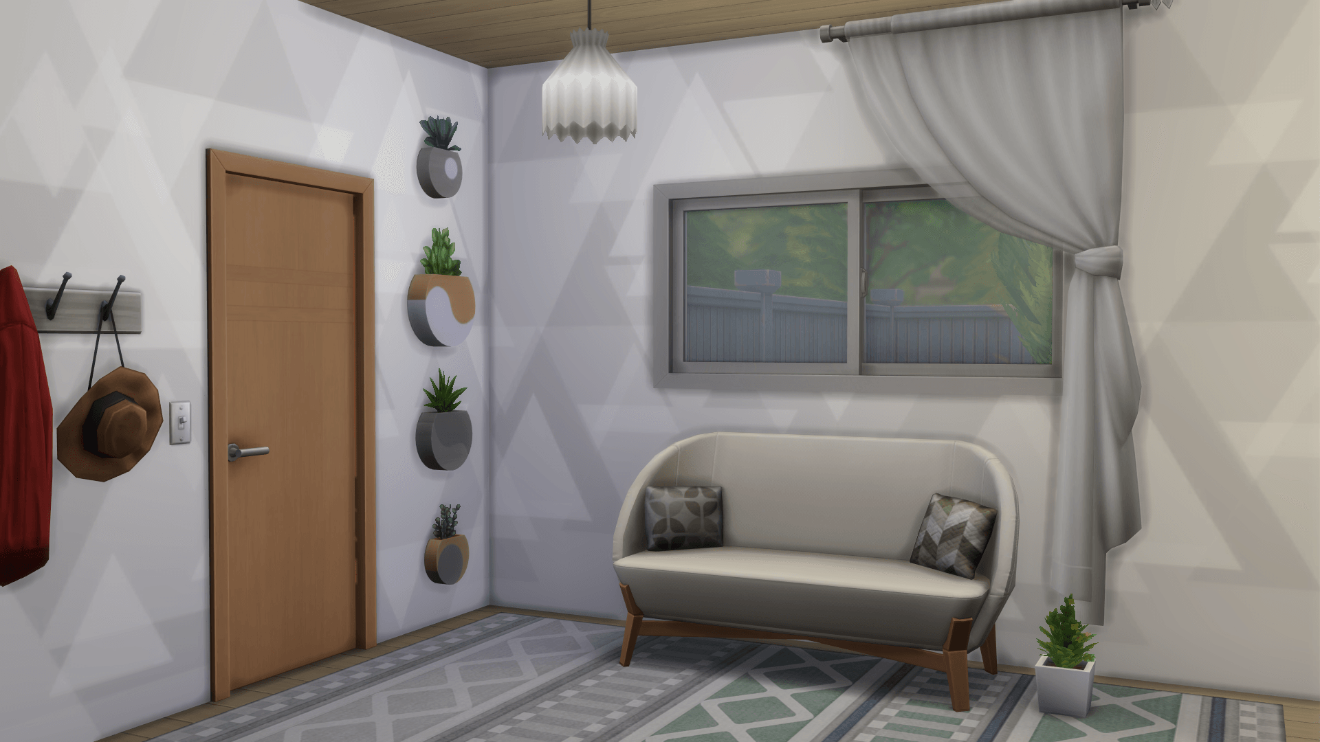 A entry area that is making use of one of the new loveseats and the separated wall-mounted plant set