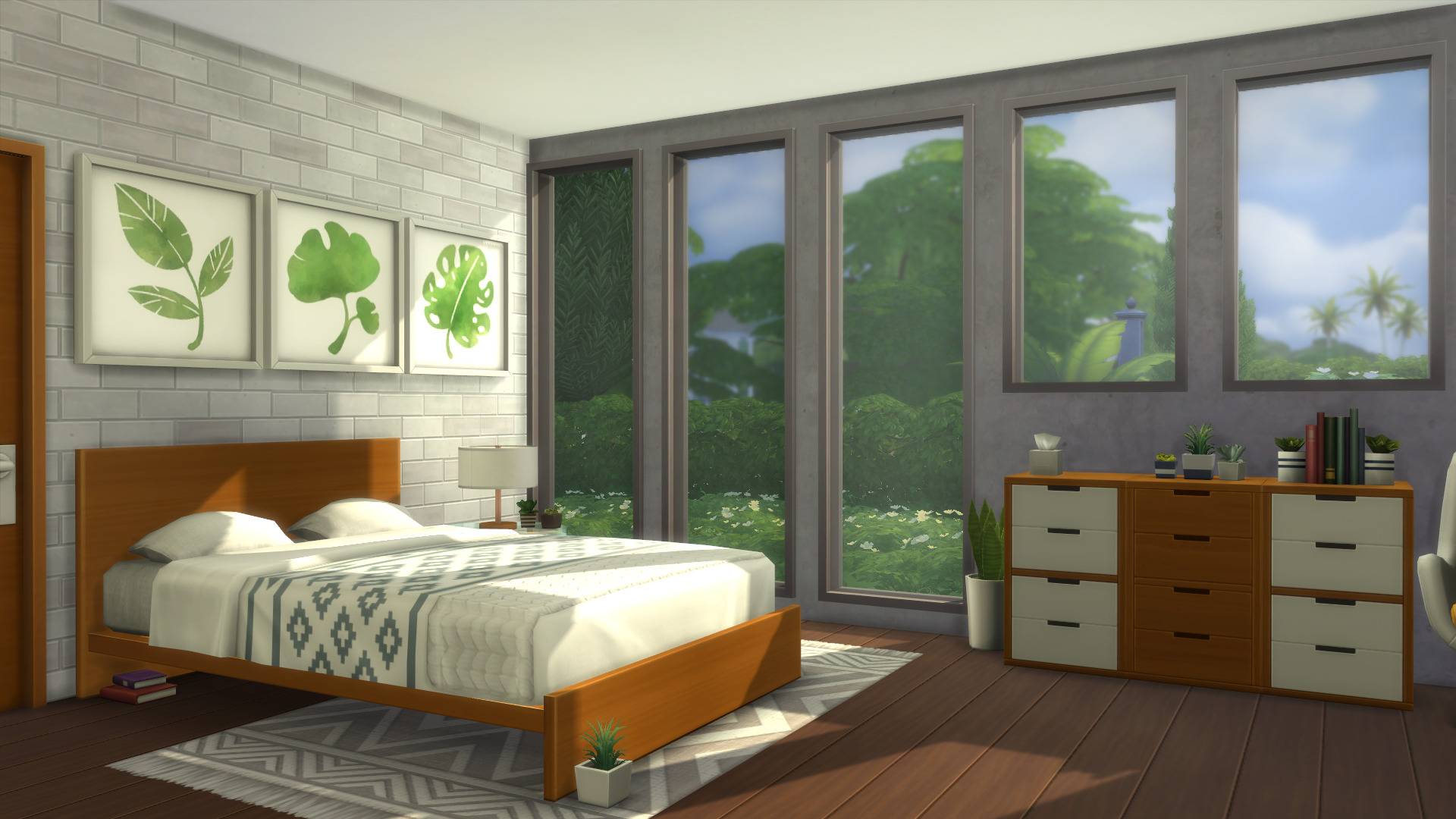 A bedroom making use of the new bed, windows, dresser and plant