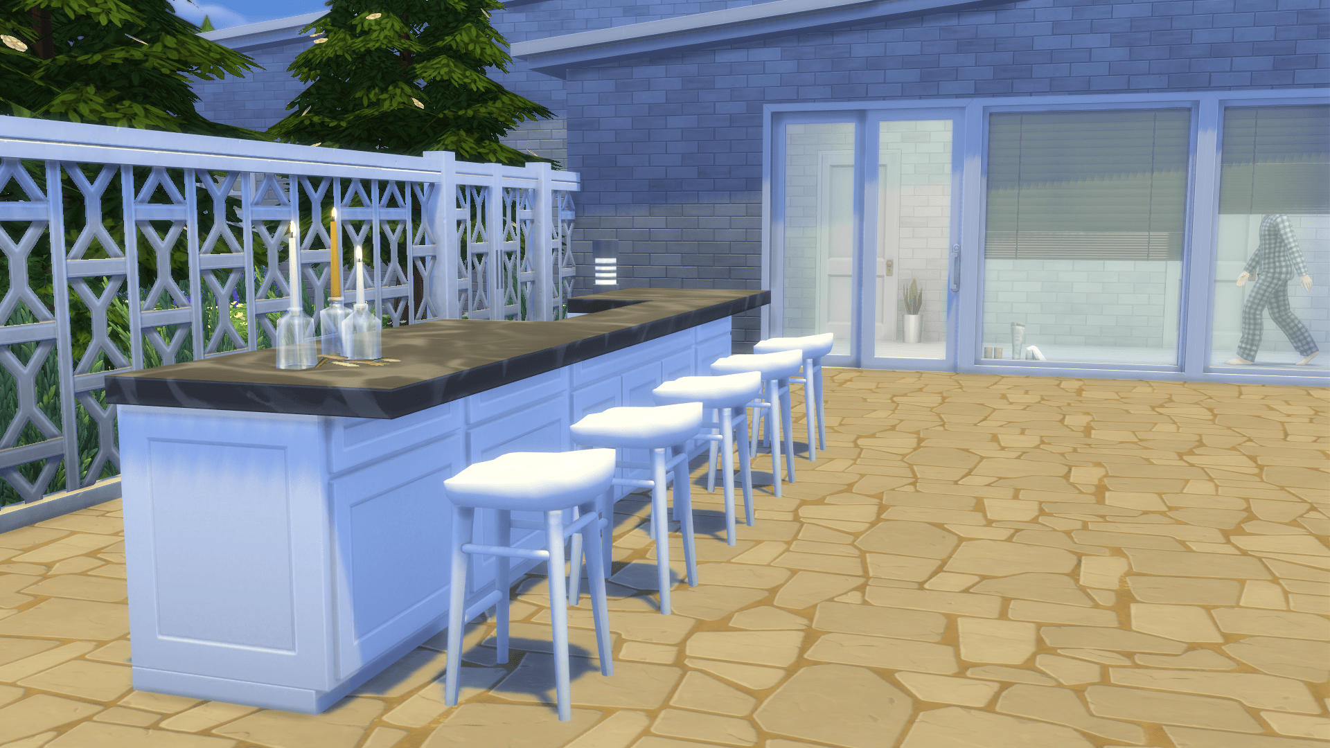 Outdoor area making use of the new island counters, gate and blinds.