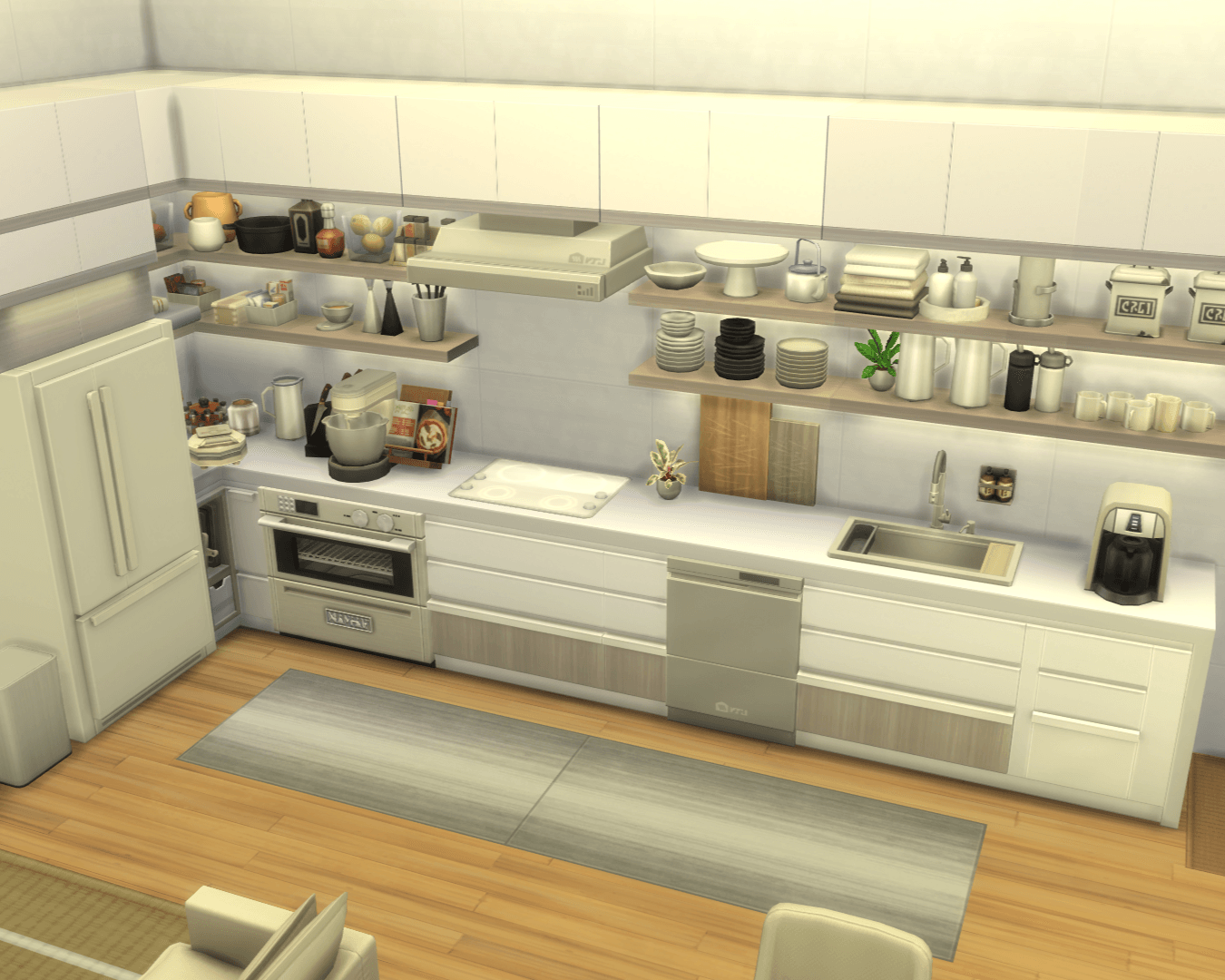 overview of the kitchen, shelves cluttered neatly w/plates, serving dishes, mugs, tea towels and more!