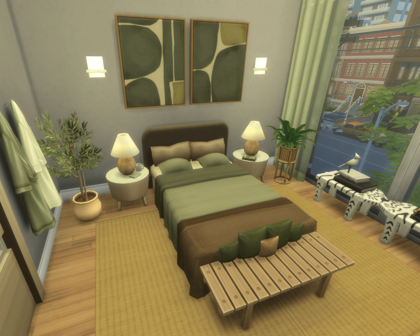 overview of the bedroom area, with matching bedside tables, lamps & wall sconces. End of bed stool and "kissing zebras" table with "drinks tray" and books!
