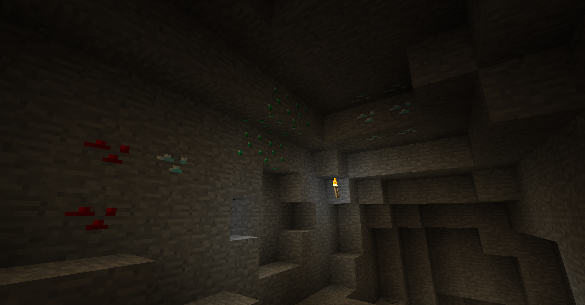 Some blocks of poor ore spawned in a cave by worldgen.