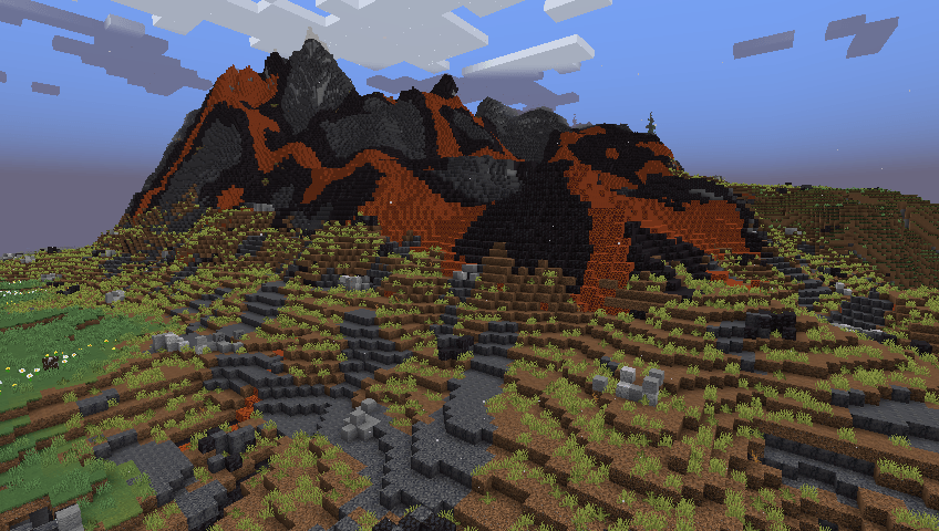 Thumbnail Volcanoes and the lava plateaus spreading at their base, where cooled lava has solidified and plants have begun to sprout.