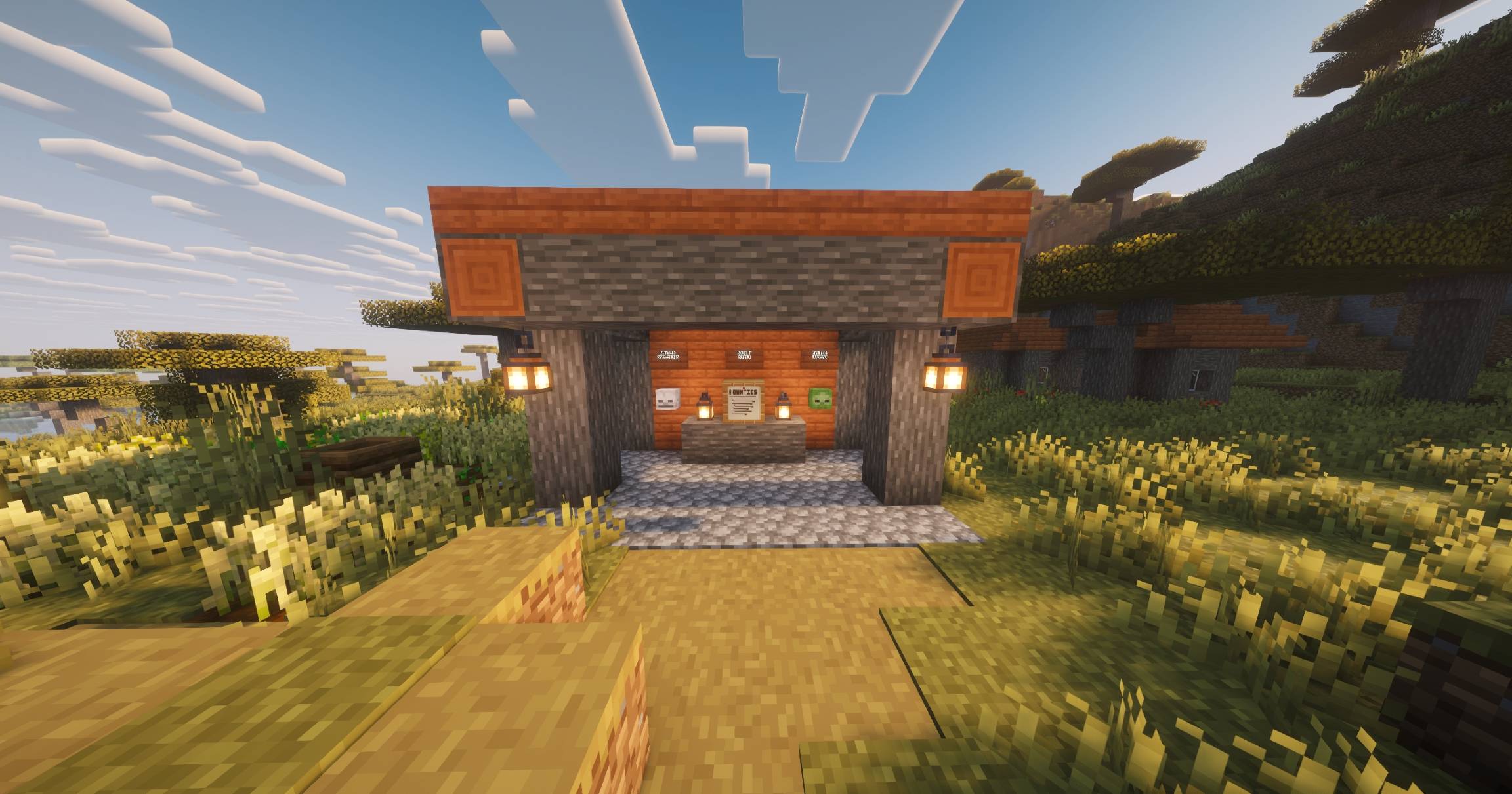 Thumbnail A bounty board structure in a savanna village right at the end of the path.