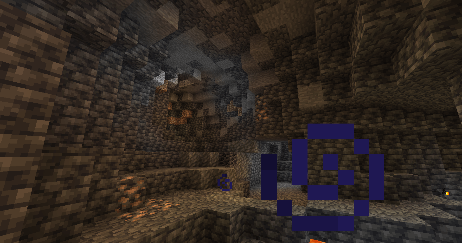 A look at the smooth transition and dark ambiance of the deepslate layers, where sculk patches and new ores await exploration.