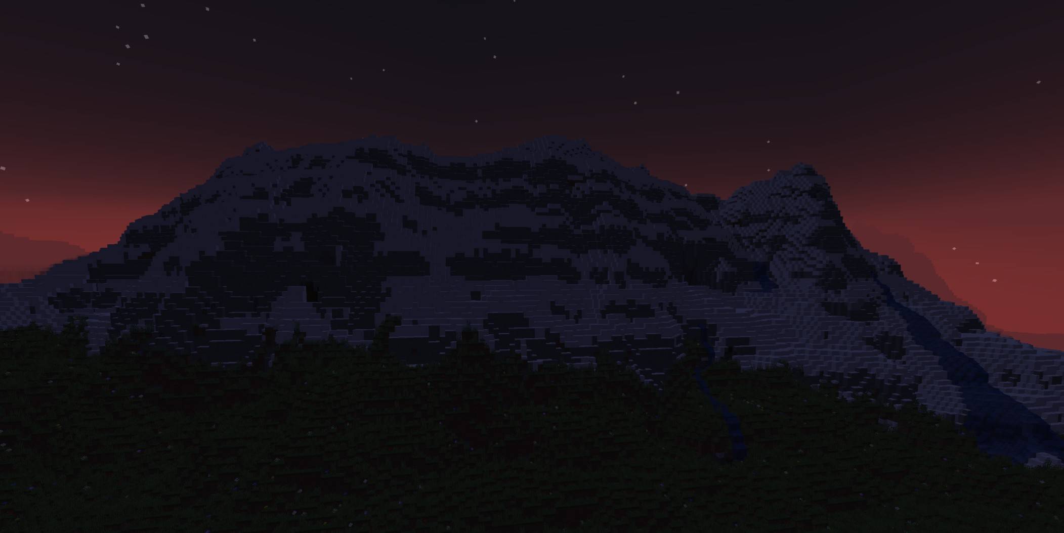 Thumbnail The new snow blanketing a mountain