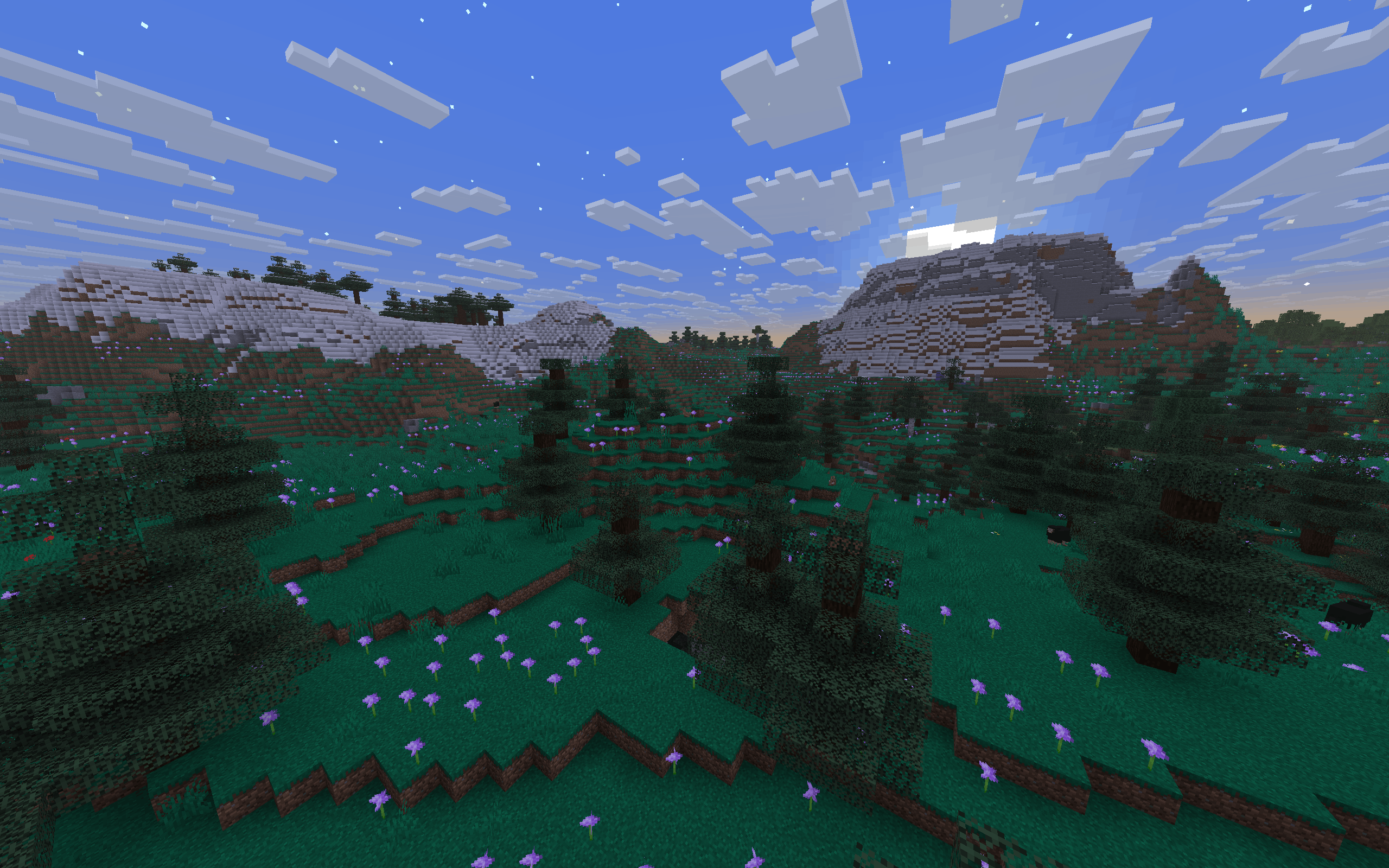 Amidst the open fields there are patches of more forested areas. Watch out for the bees and berry bushes!