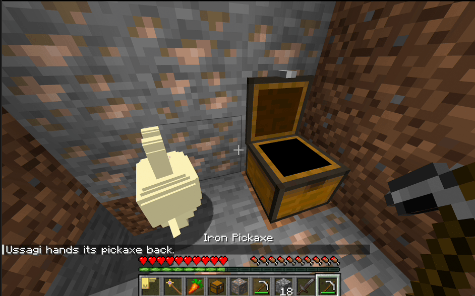 Usagi opens the deposit chest to drop off items — and hands its pickaxe back when you ask.