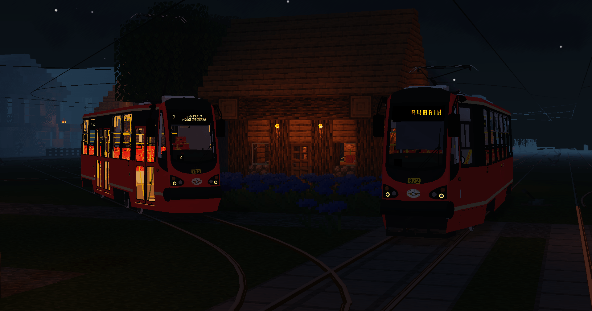 Thumbnail Two 105N-HF11AC trams with orange boards and white boards at night.png