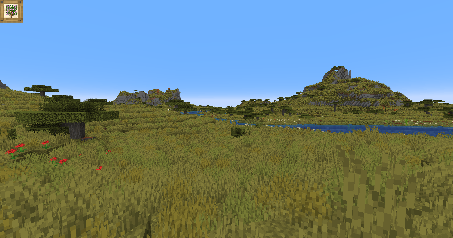 Thumbnail The hot Savanna stretches as far as the eye can see, the only shade other than a copse of acacia trees near the river a few lone trees.