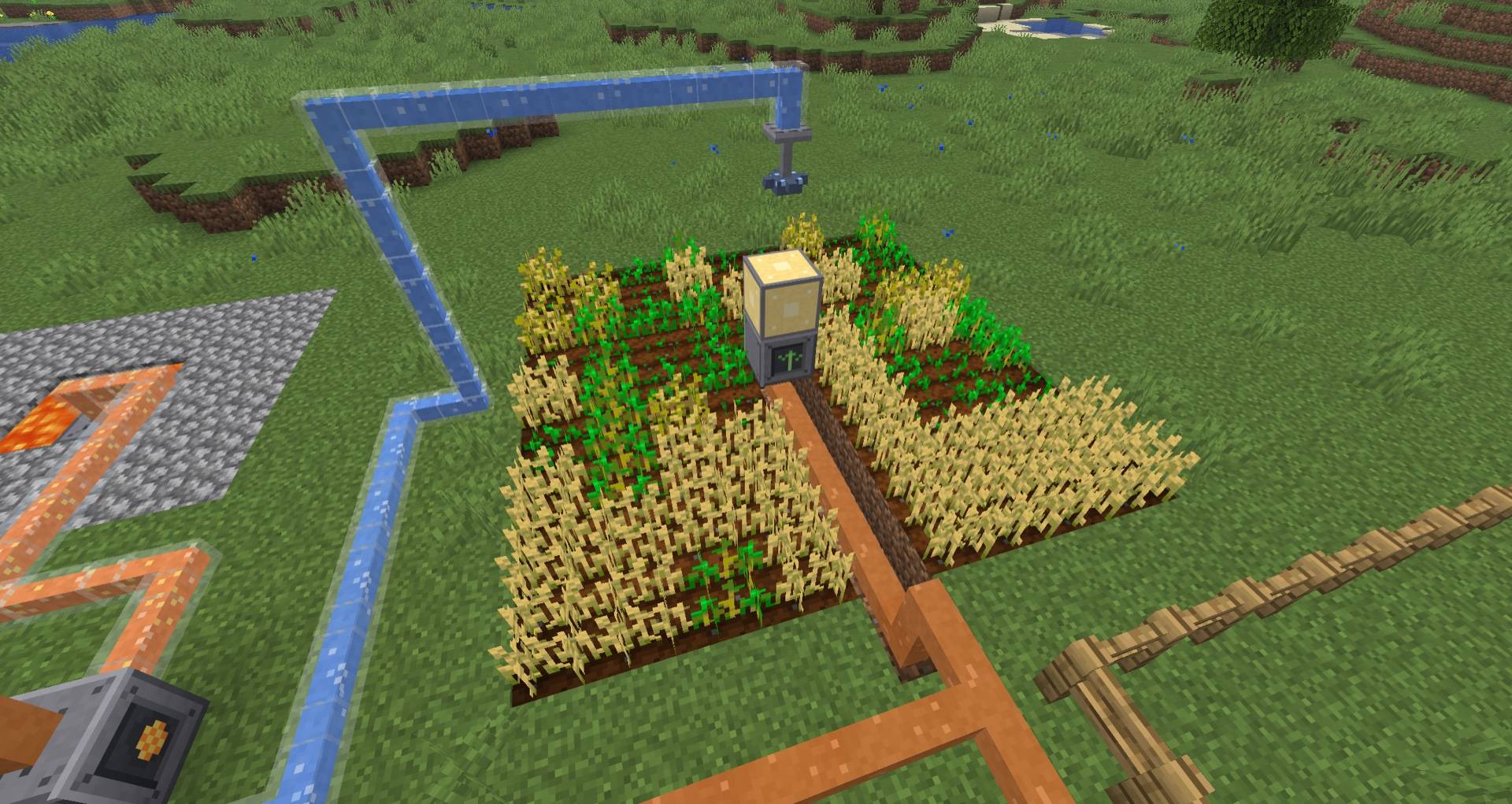 A Harvester block will harvest and replant crops, while the Grow Lamp and Sprinkler keep the crops healthy