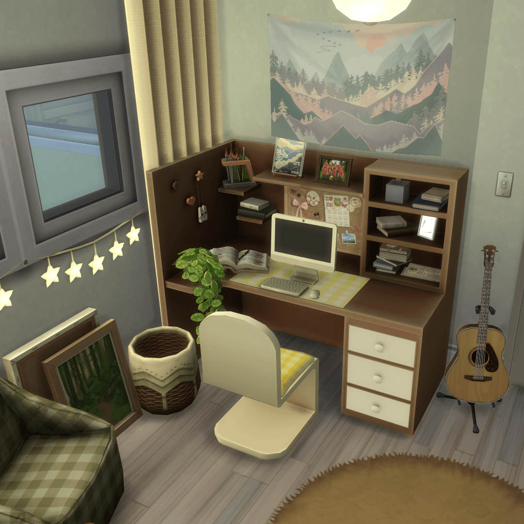 A desk/study area with a computer, a plant, a guitar, and books clutter, great for gaming or working from home!