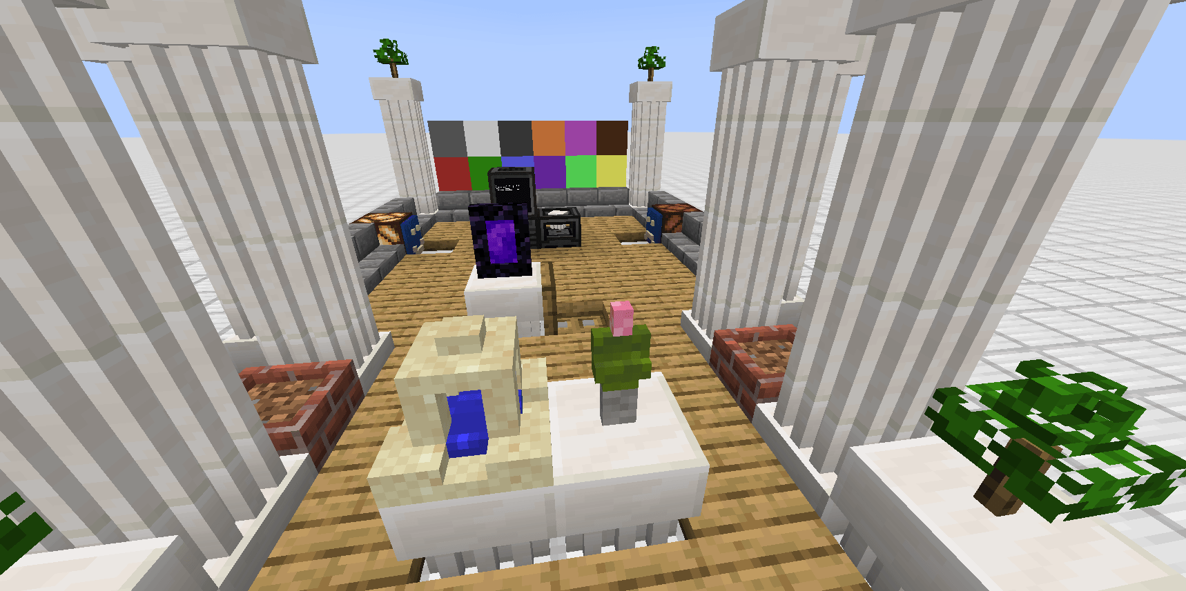 A handful of 3D printed decorations, such as trees, wells with water inside, a villager, pillars, and also multi-colored Chamelium blocks!