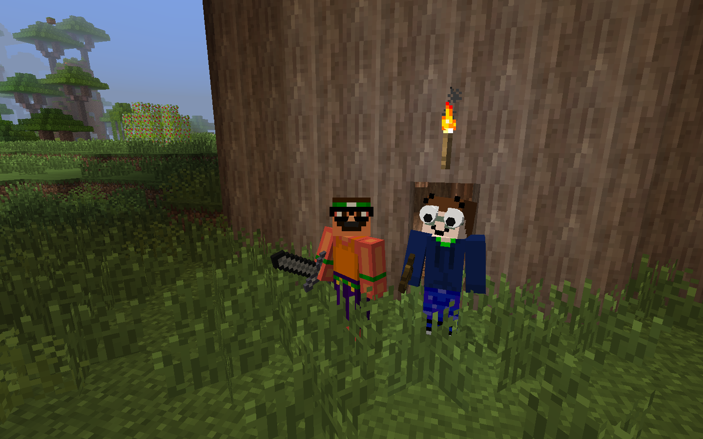 Some guys wearing goofy hats.