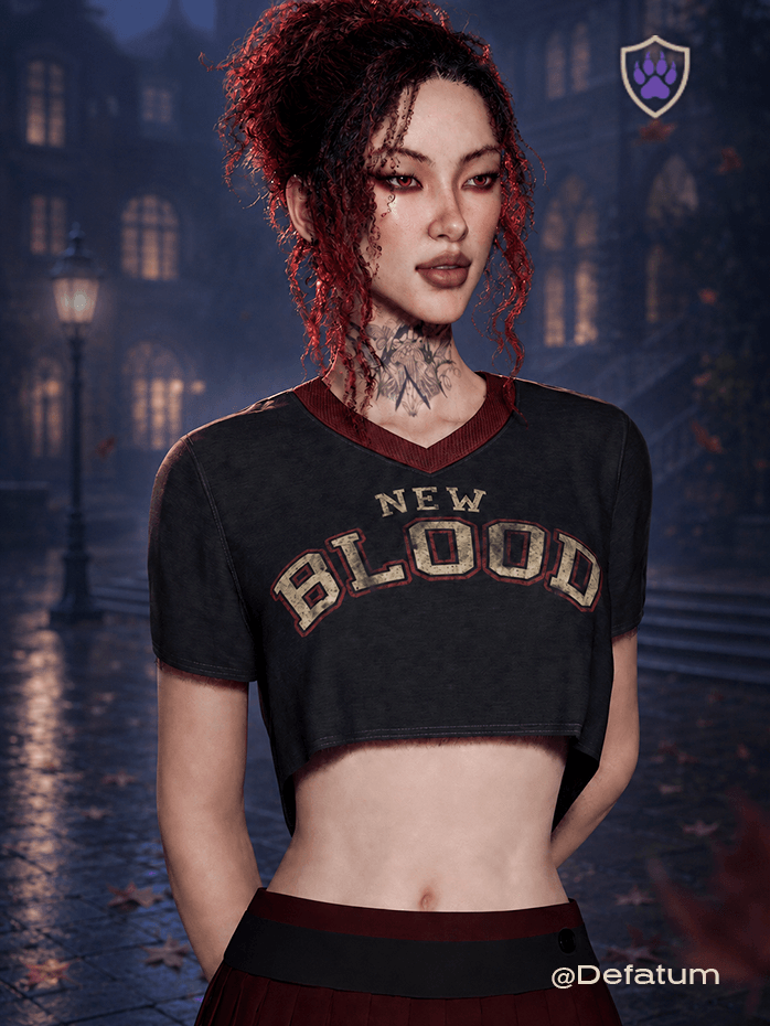 The NEW BLOOD crop top from the College Core Autumn ’26 Collection. Washed black V-neck top with oxblood trim and distressed varsity lettering, worn by the transfer student everyone seems to have a story about.
