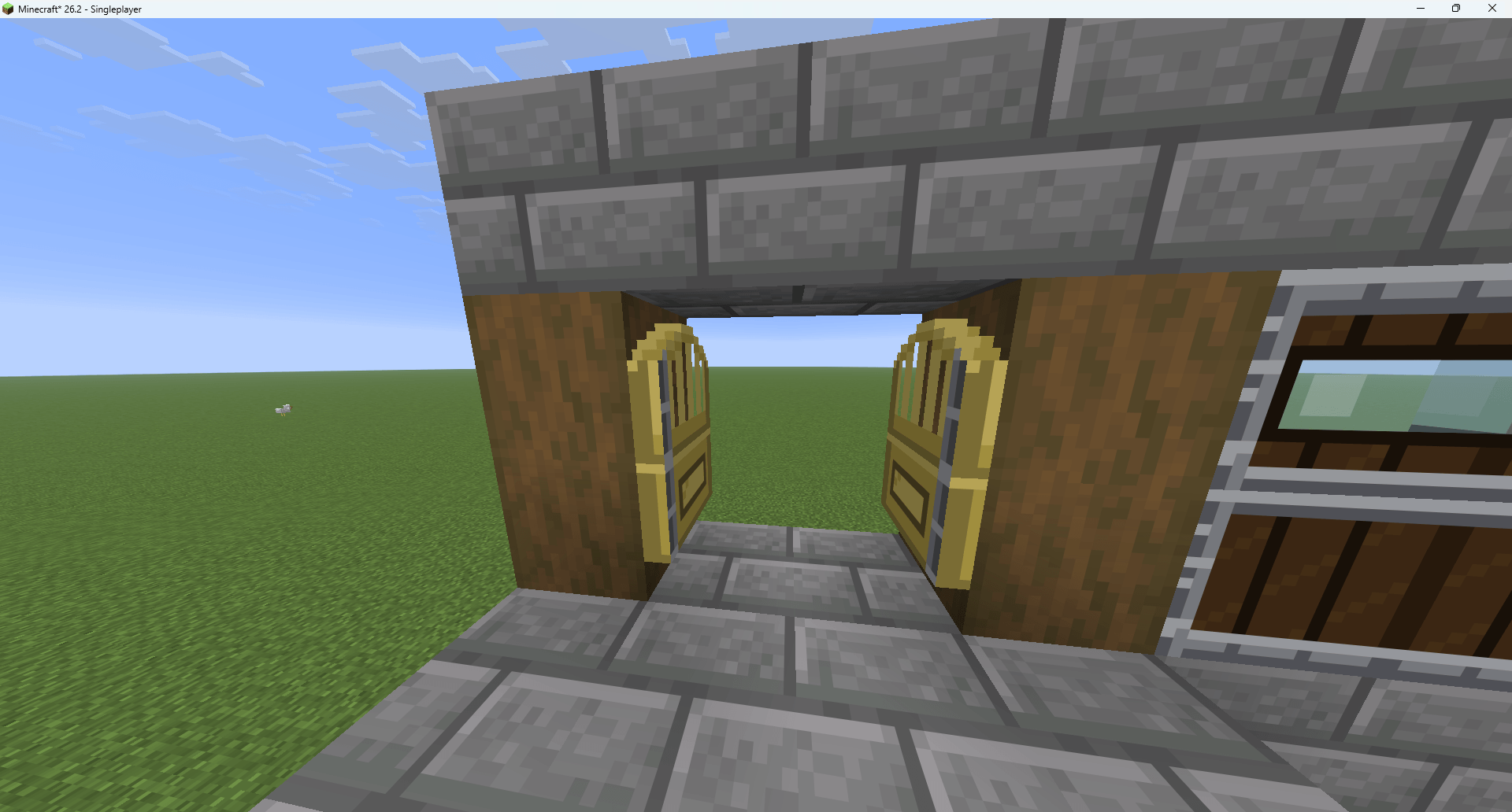 Thumbnail Both leaves swing apart from the centre together. This is one door, not two placed side by side.