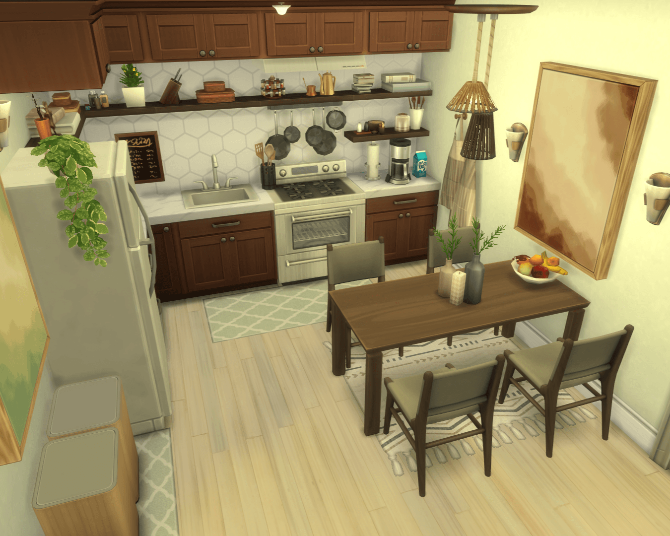 Thumbnail Overview of the kitchen & dining area with a coffee corner, bin area, a four-seater dining table and decorated shelves!
