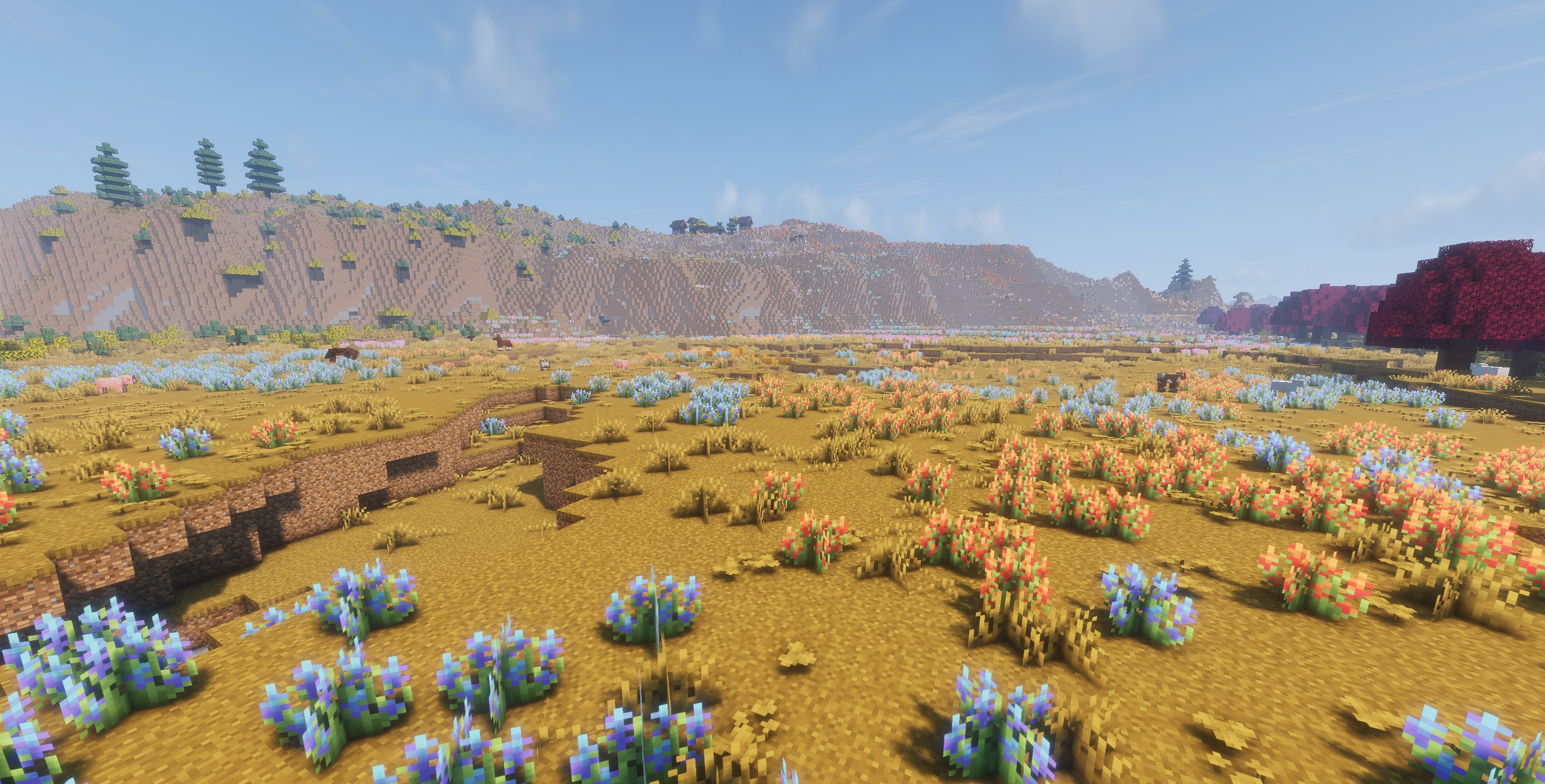 Seasonal colors and models rendered across distant terrain