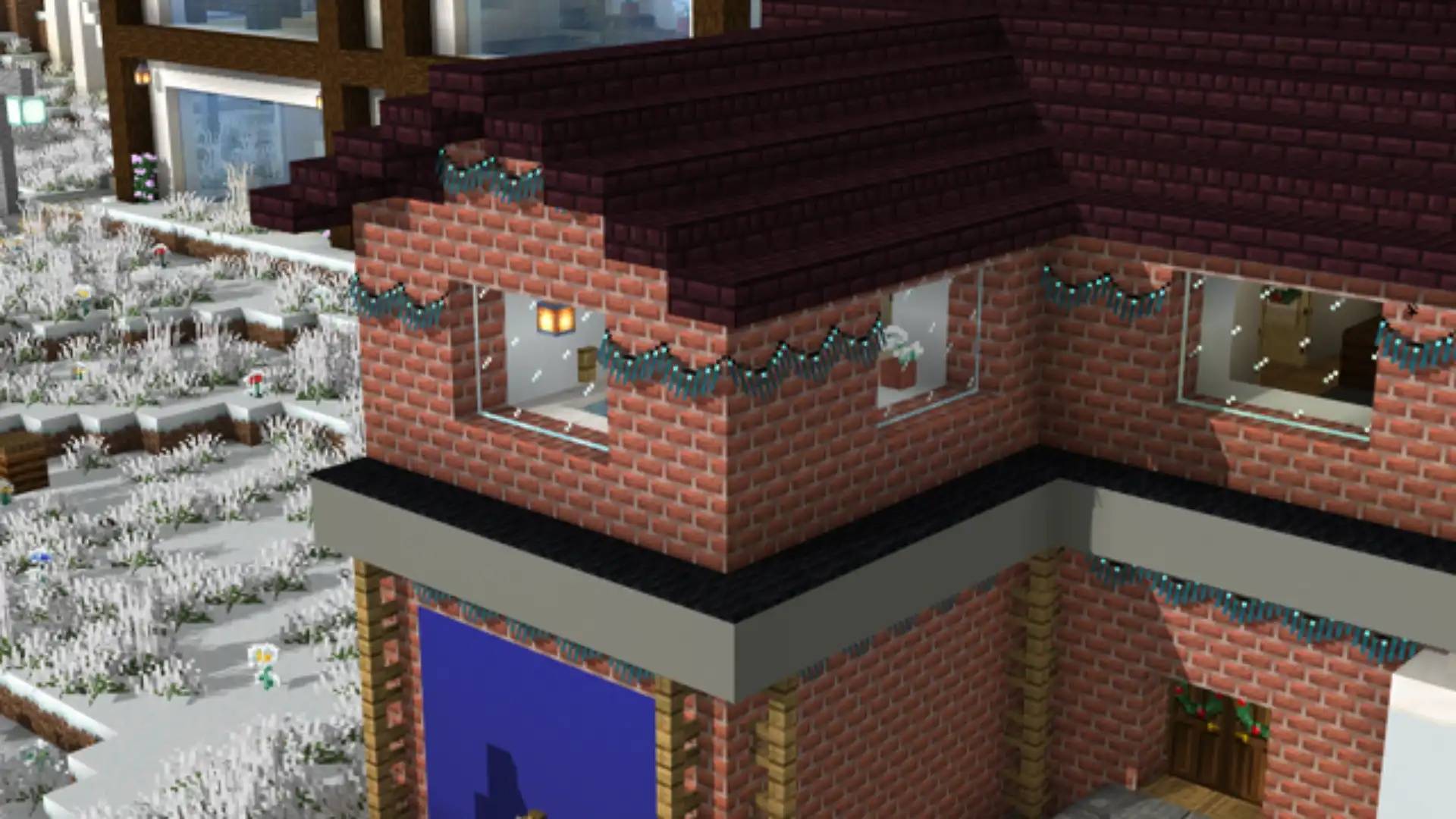 Icicle lights hung along a brick house