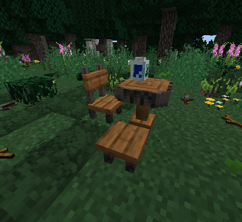 Thumbnail A lovely outside table with a jar of blueberry jam and some chairs to sit and listen to the sound of nature