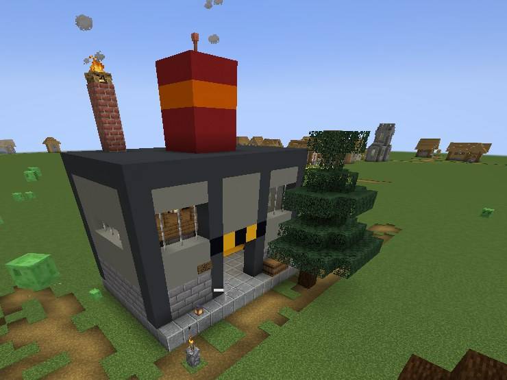 Thumbnail O galpão do Engenheiro numa vila de taiga, com chaminés e o tanque gigante.