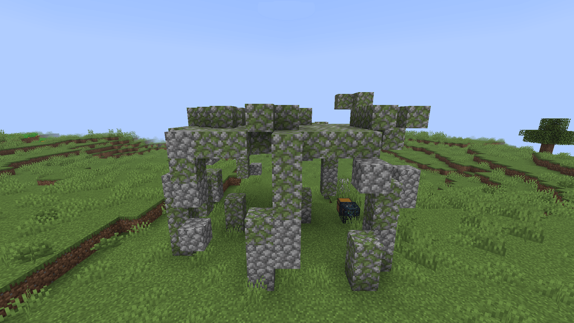 Thumbnail A mossy ruin out on the plains, with a spawner still inside.
