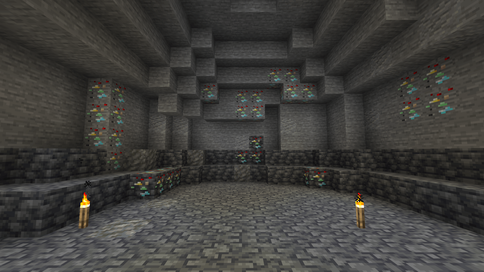 Thumbnail Randomite and deepslate randomite in the walls of a cave.
