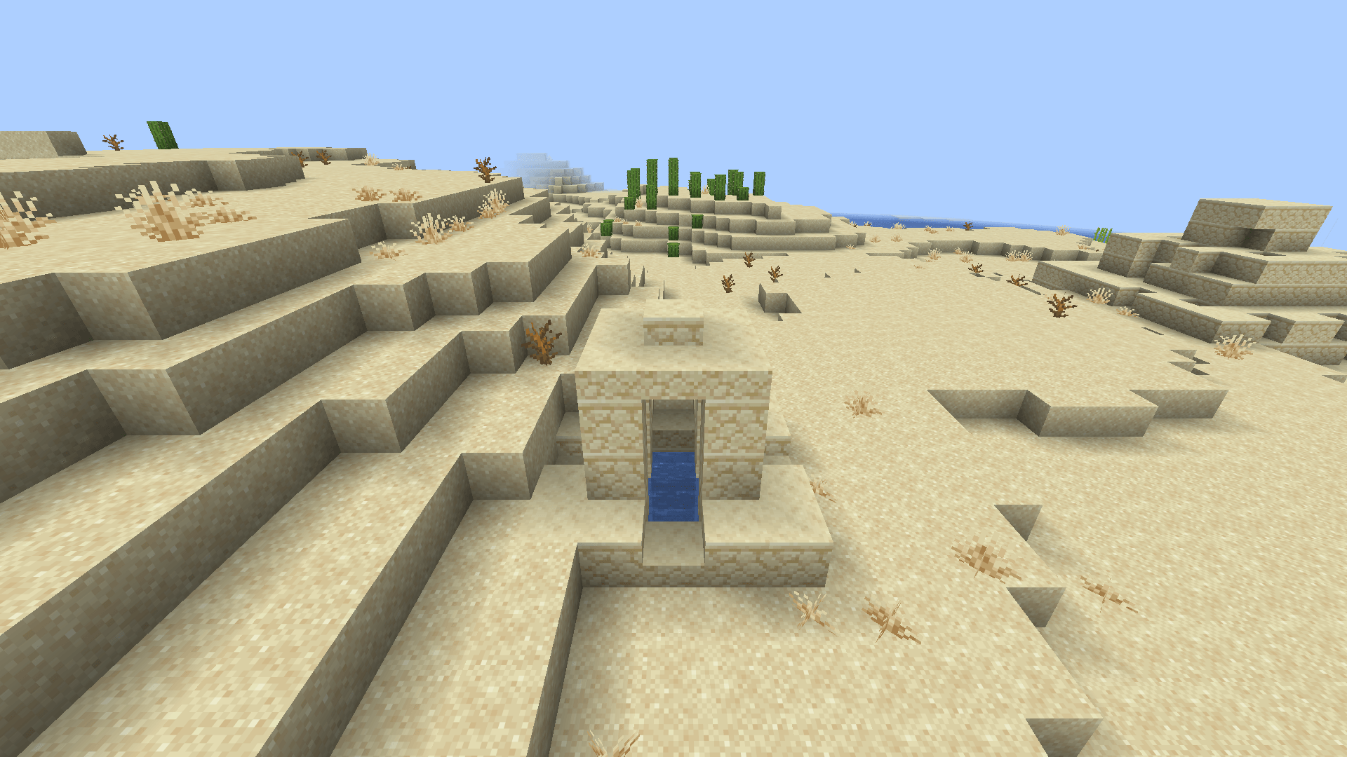 Thumbnail A desert well. These take the place of vanilla's, with a shaft up to 30 blocks deep and a chest at the bottom.