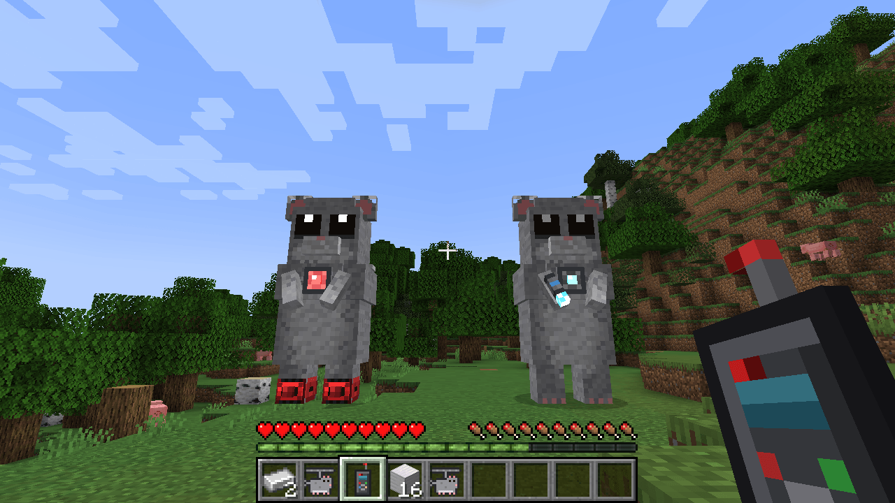 Thumbnail The red Speaker Hims Robot (left) and the Hamster Robot (right), two 6-block-tall hamster mechs you can pilot.