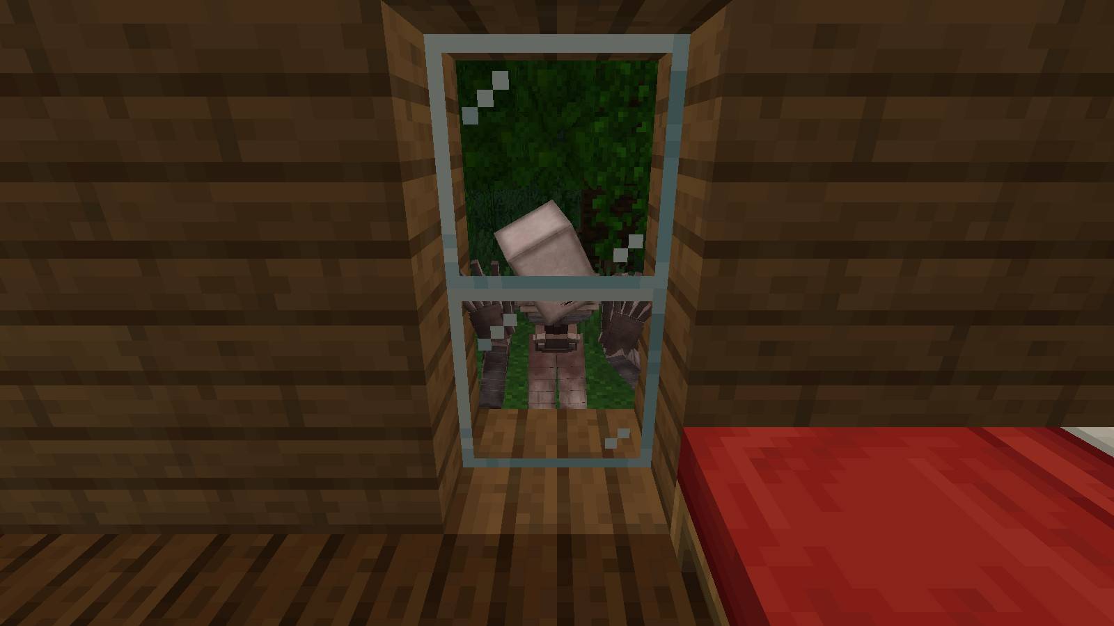 Its face at the cabin window