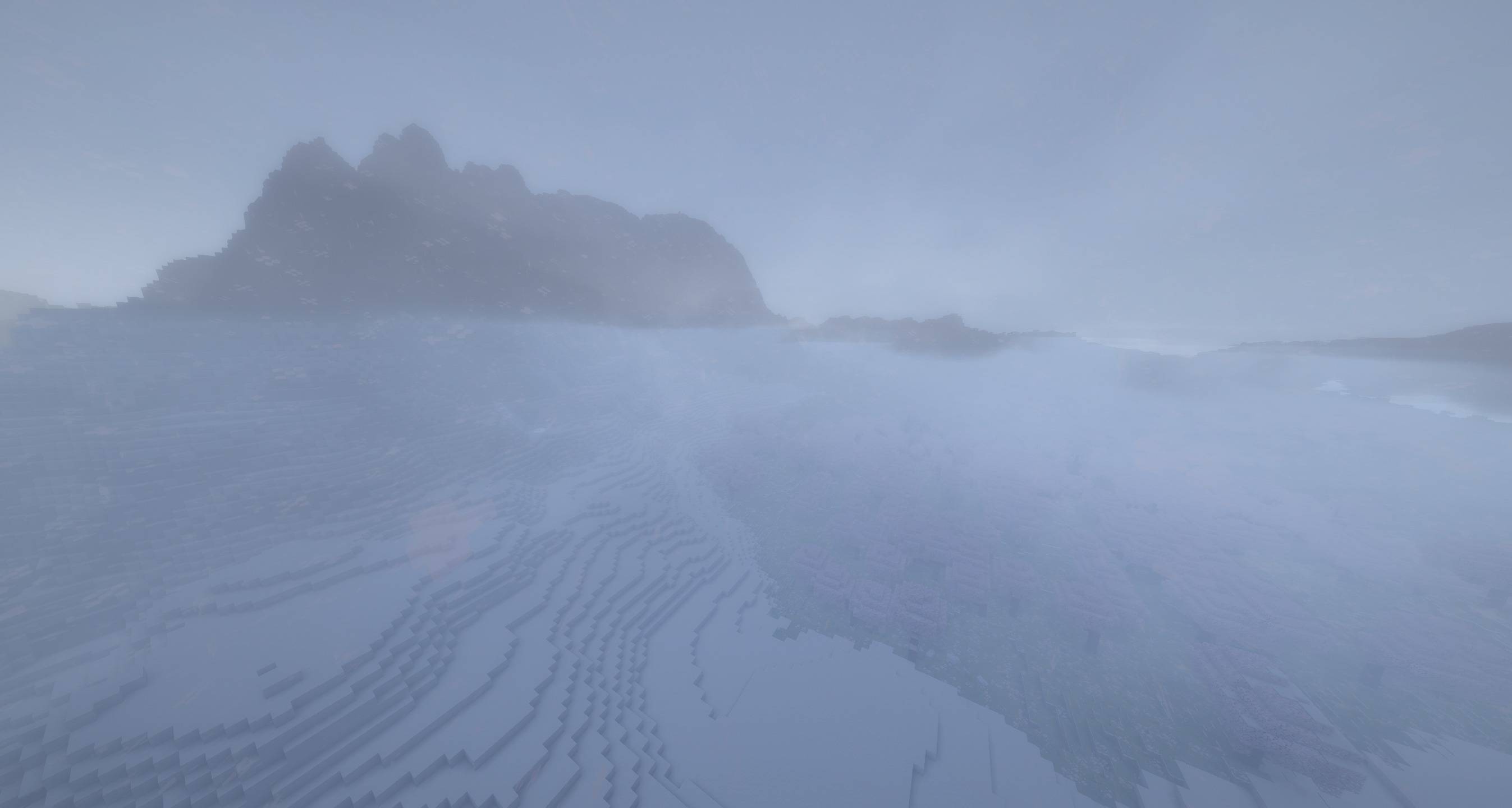Thumbnail Cold mountain weather with snowfall, low visibility and terrain-following clouds.
