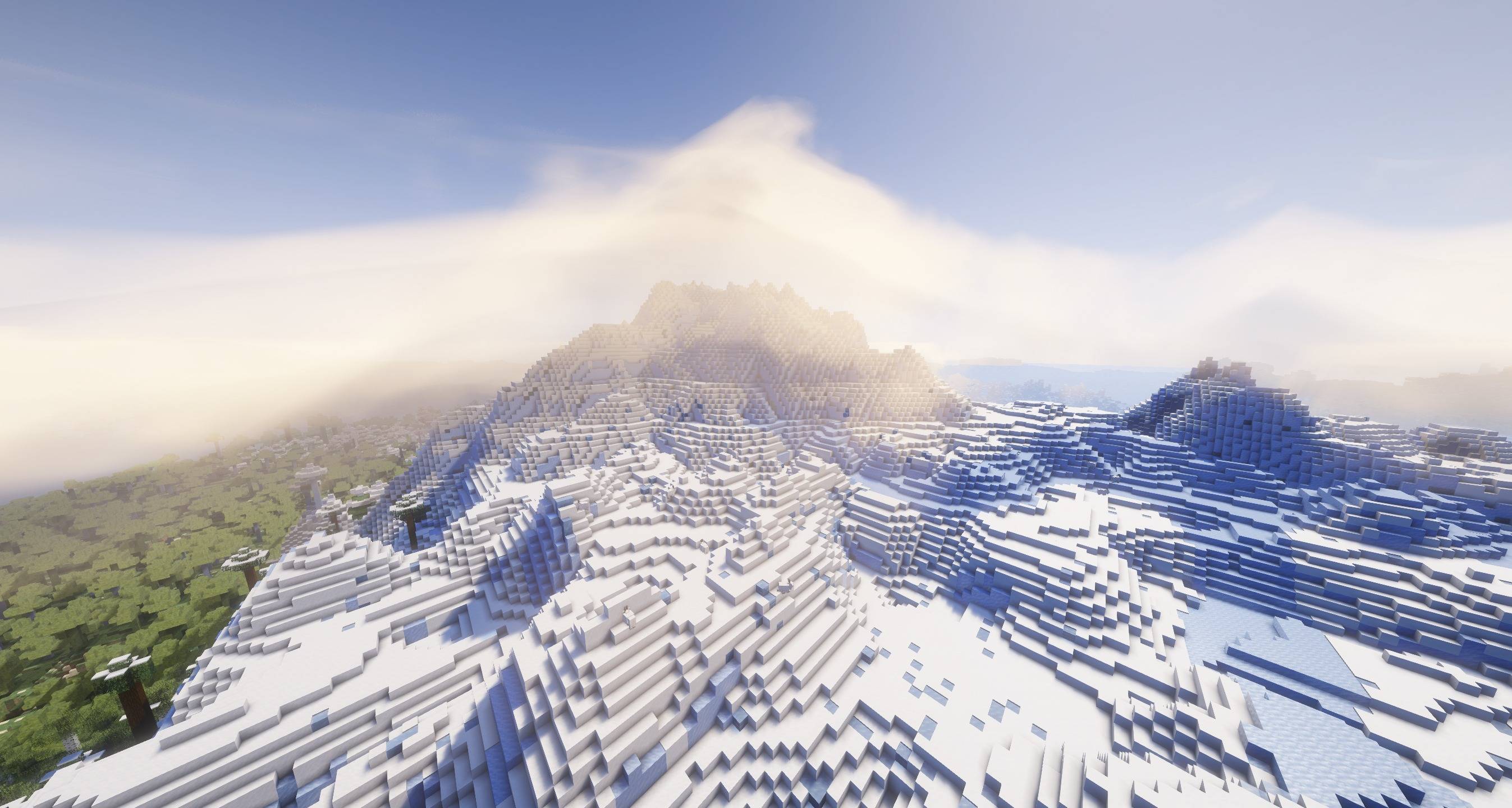 Thumbnail Clear daylight over frozen mountain peaks, showing bright snow and soft volumetric cloud lighting.