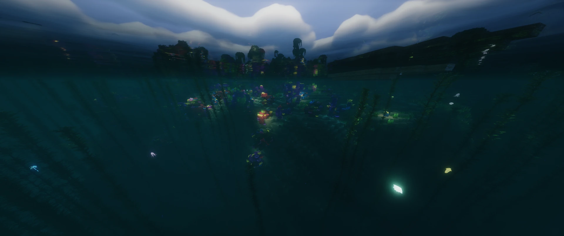 Thumbnail The reef from just under the surface, the island above it. Taken with the Packtrix resource pack and AstraLex shaders.