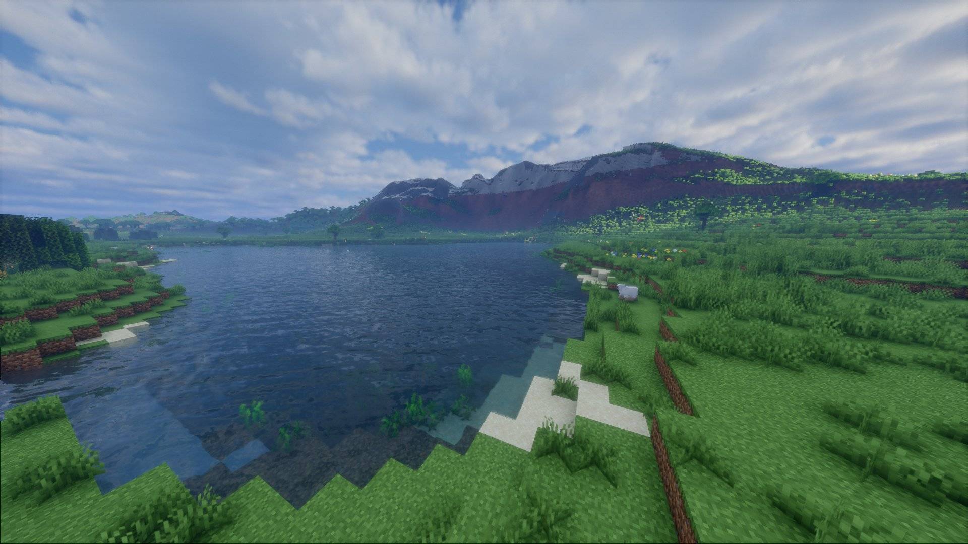 A lake under the mountains