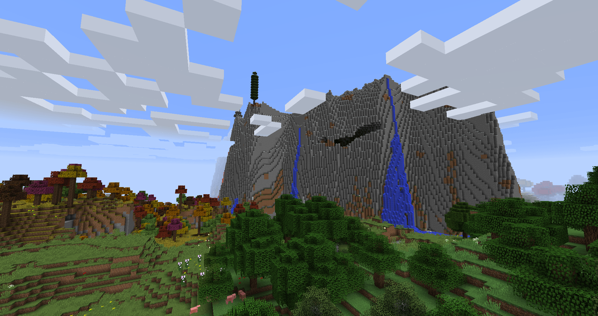 Cliffs and Autumnal Oak Forest biomes from the distance.