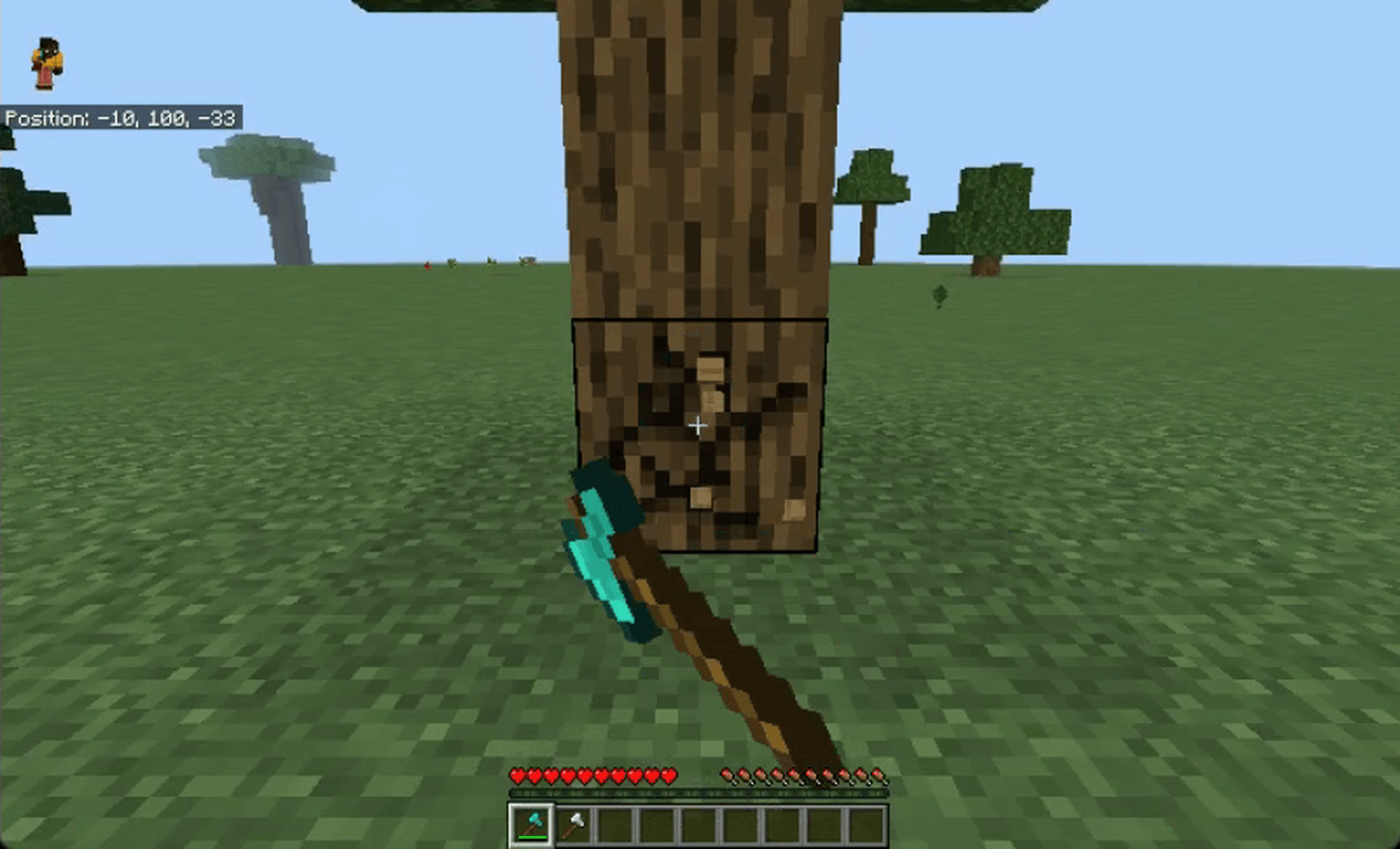 Thumbnail Sneak, hold an axe and break the lowest log of the tree.
